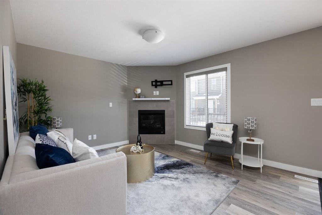 57-401 Athabasca Avenue, Fort Mcmurray, AB - Indoor Photo Showing Living Room With Fireplace