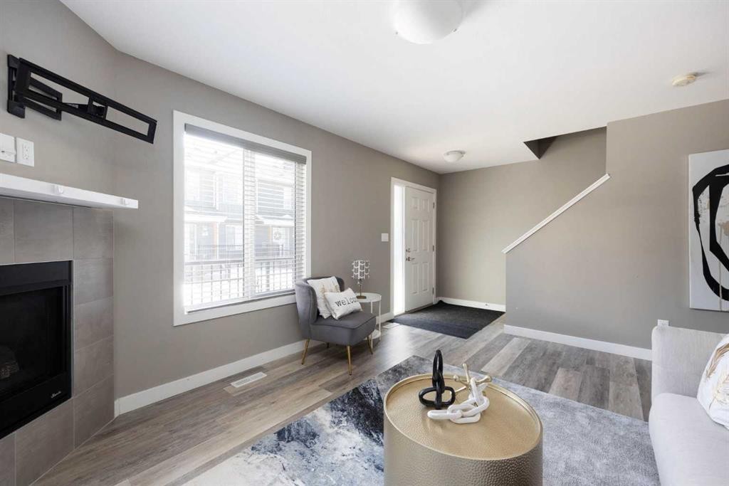 57-401 Athabasca Avenue, Fort Mcmurray, AB - Indoor Photo Showing Living Room With Fireplace