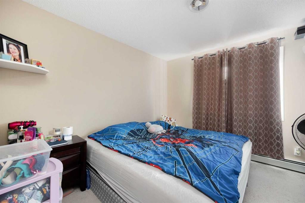 111-100 Richard Street, Fort Mcmurray, AB - Indoor Photo Showing Bedroom