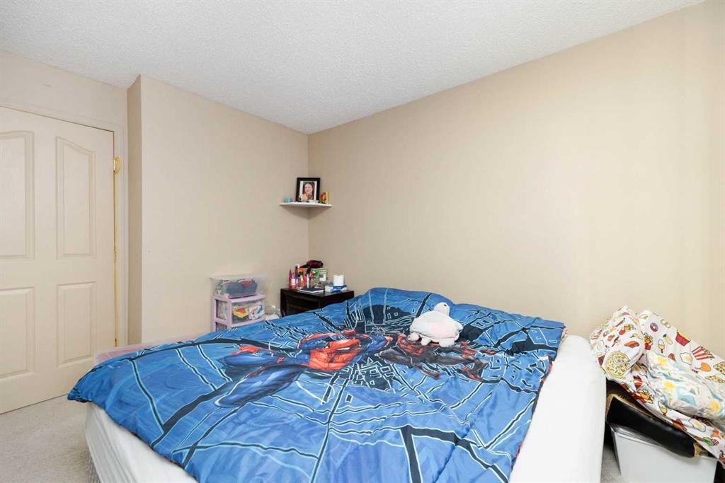 111-100 Richard Street, Fort Mcmurray, AB - Indoor Photo Showing Bedroom