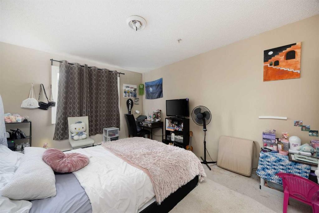 111-100 Richard Street, Fort Mcmurray, AB - Indoor Photo Showing Bedroom