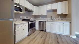 36-100 St. Laurent Way, Fort Mcmurray, AB - Indoor Photo Showing Kitchen