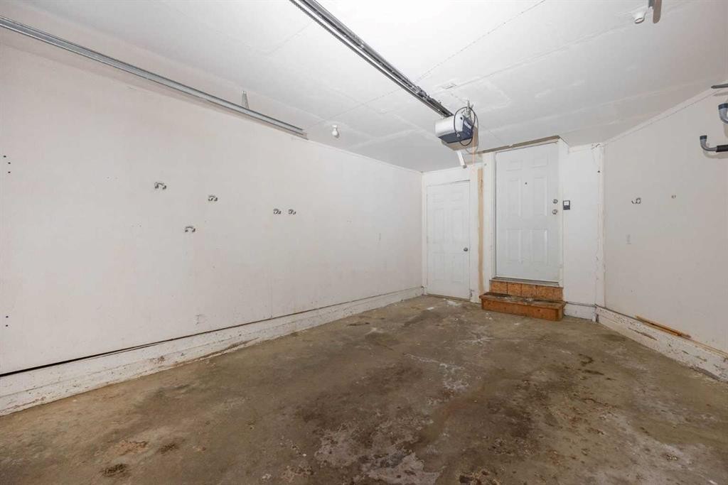 153 Leitner Gate, Fort Mcmurray, AB - Indoor Photo Showing Garage