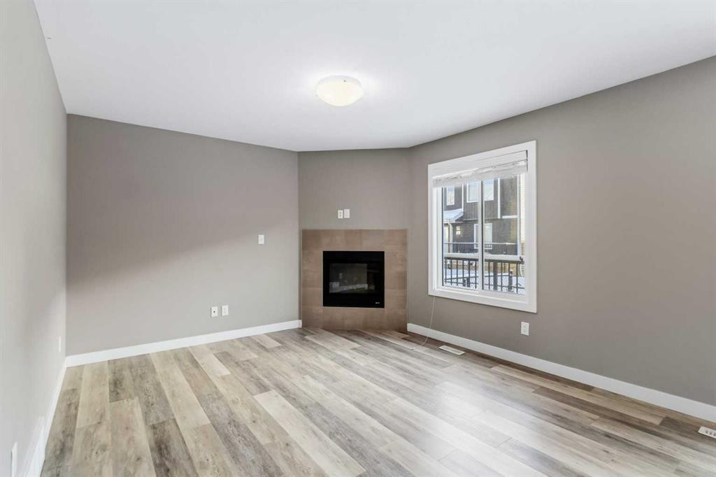 53-401 Athabasca Avenue, Fort Mcmurray, AB - Indoor Photo Showing Living Room With Fireplace