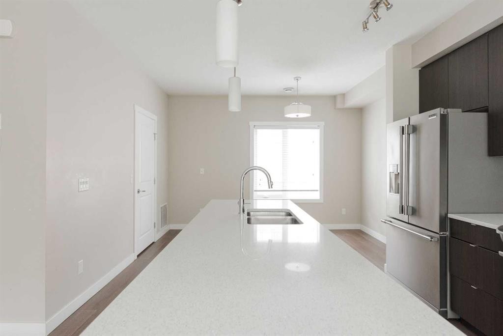 44-141 Fontaine Crescent, Fort Mcmurray, AB - Indoor Photo Showing Kitchen With Double Sink
