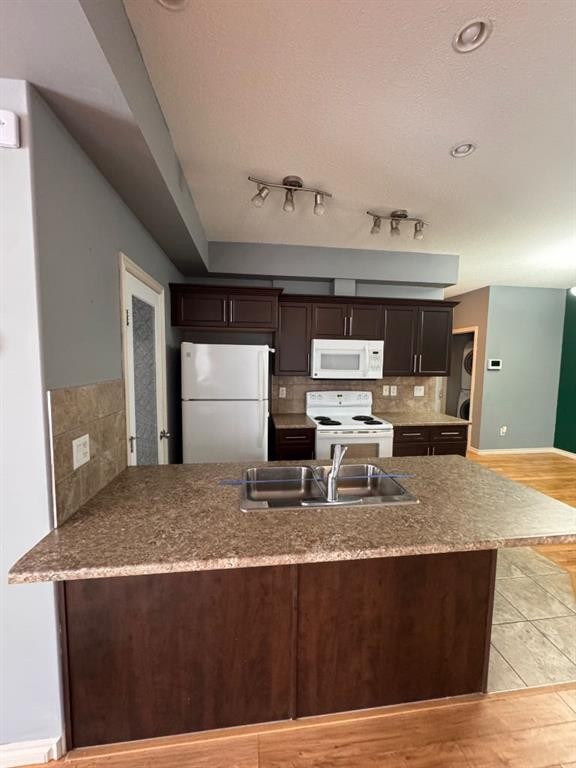 102-109 Fontaine Crescent, Fort Mcmurray, AB - Indoor Photo Showing Kitchen With Double Sink