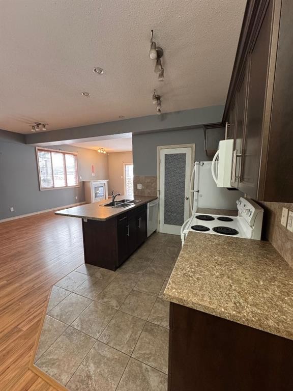 102-109 Fontaine Crescent, Fort Mcmurray, AB - Indoor Photo Showing Kitchen With Double Sink