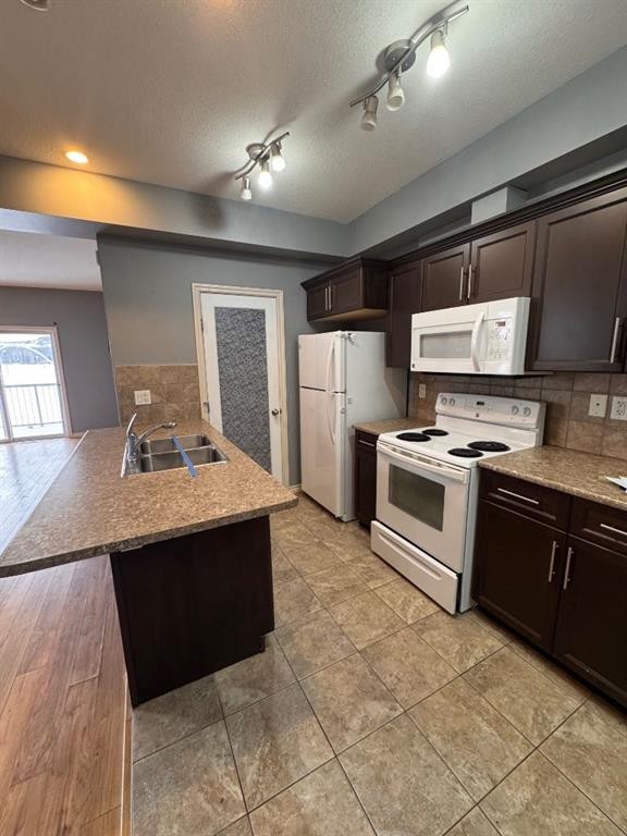 102-109 Fontaine Crescent, Fort Mcmurray, AB - Indoor Photo Showing Kitchen With Double Sink