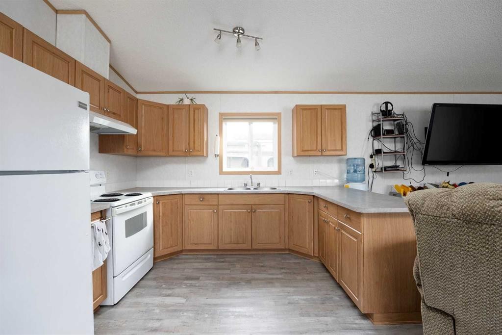 161 Grey Crescent, Fort Mcmurray, AB - Indoor Photo Showing Kitchen With Double Sink
