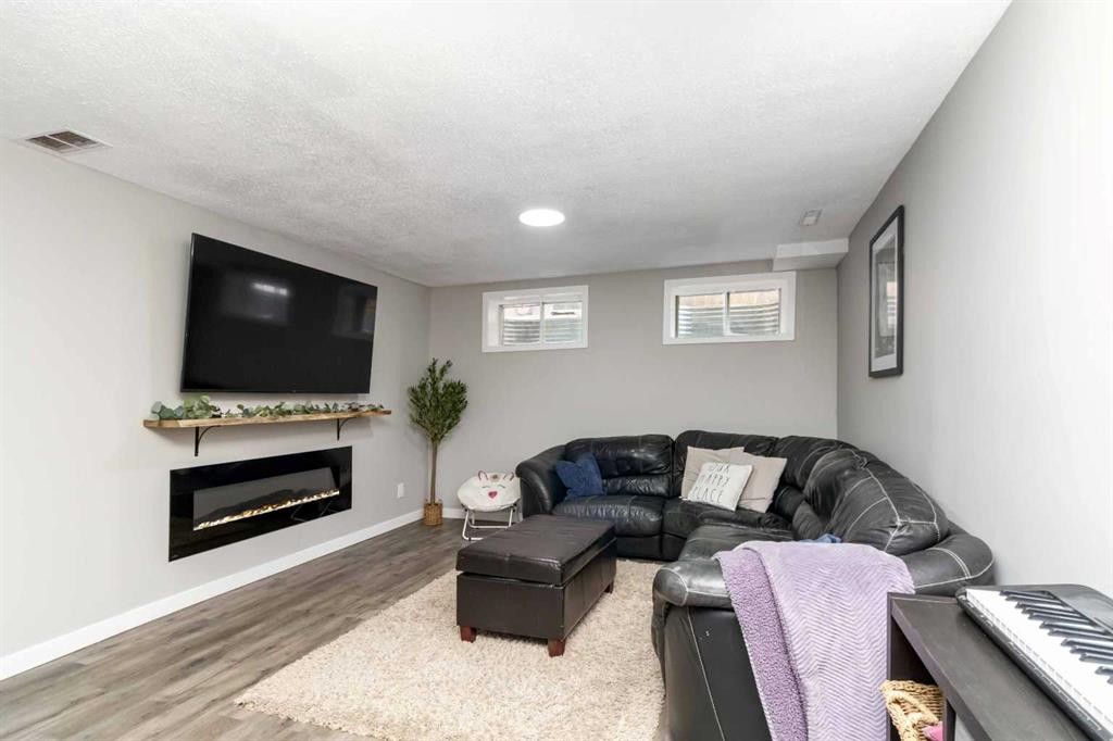 247 Cornwall Drive, Fort Mcmurray, AB - Indoor With Fireplace