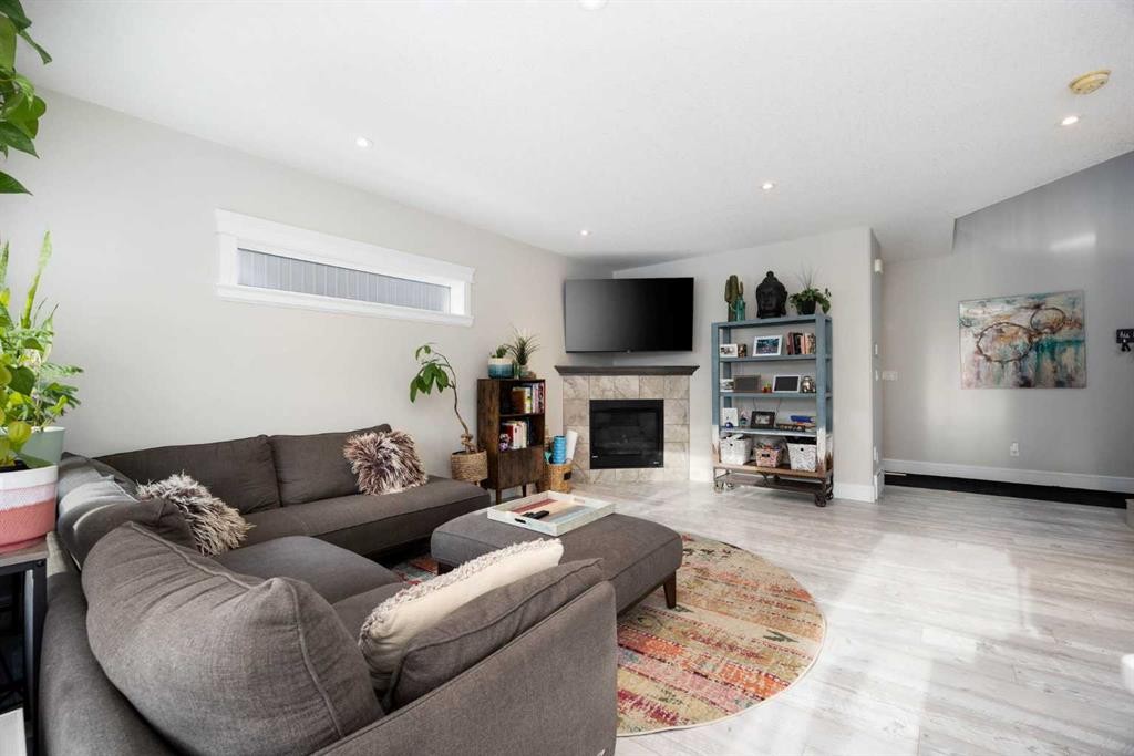141 Pearson Drive, Fort Mcmurray, AB - Indoor Photo Showing Living Room With Fireplace