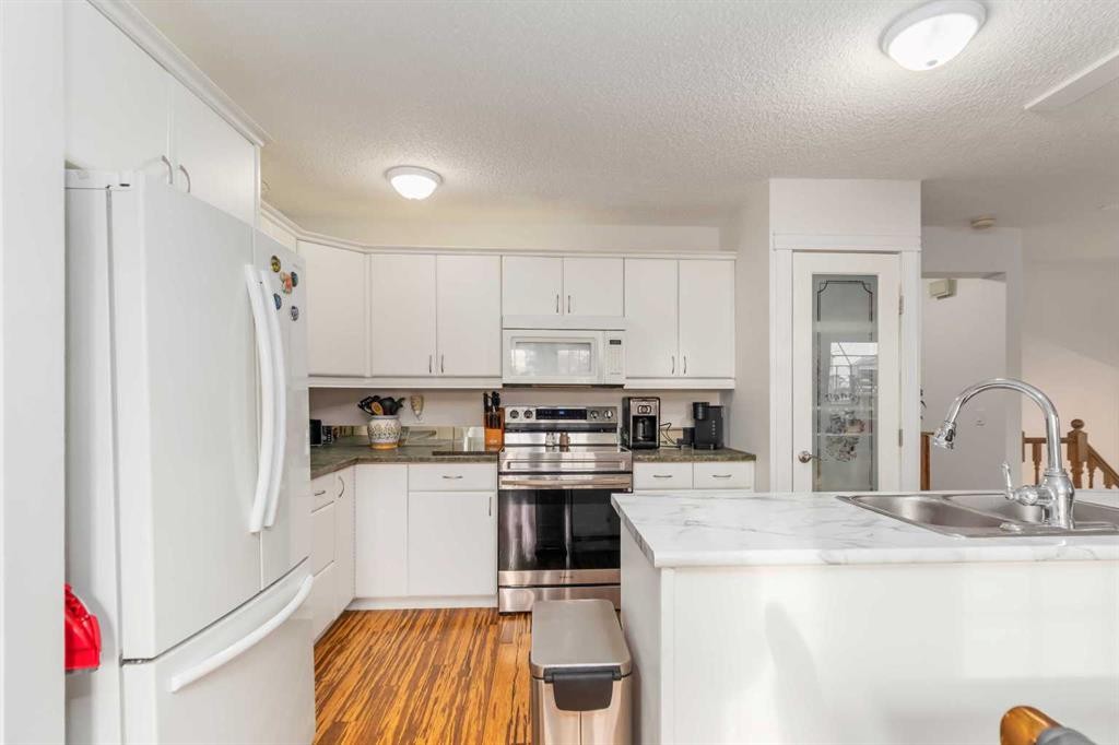 202 Bird Crescent, Fort Mcmurray, AB - Indoor Photo Showing Kitchen With Double Sink