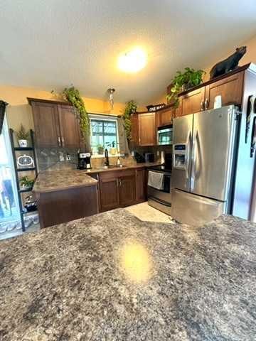 175 Poplar Drive Rr, Conklin, AB - Indoor Photo Showing Kitchen With Double Sink