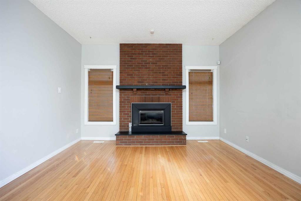 189 Farrell Crescent, Fort Mcmurray, AB - Indoor Photo Showing Living Room With Fireplace