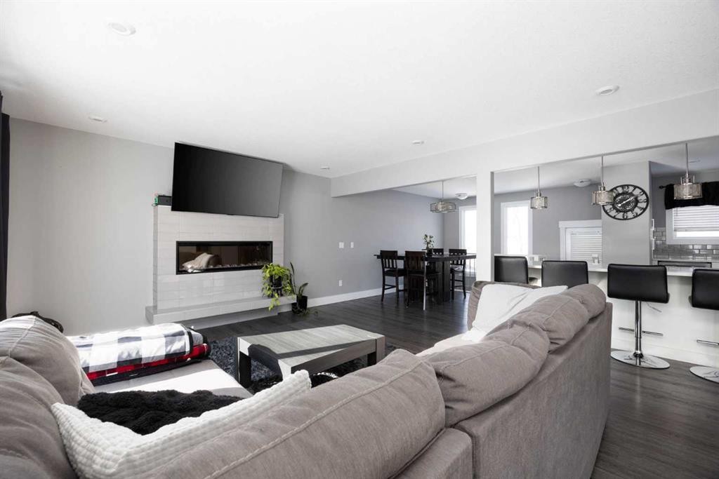 157 Beaumont Crescent, Fort Mcmurray, AB - Indoor Photo Showing Living Room With Fireplace