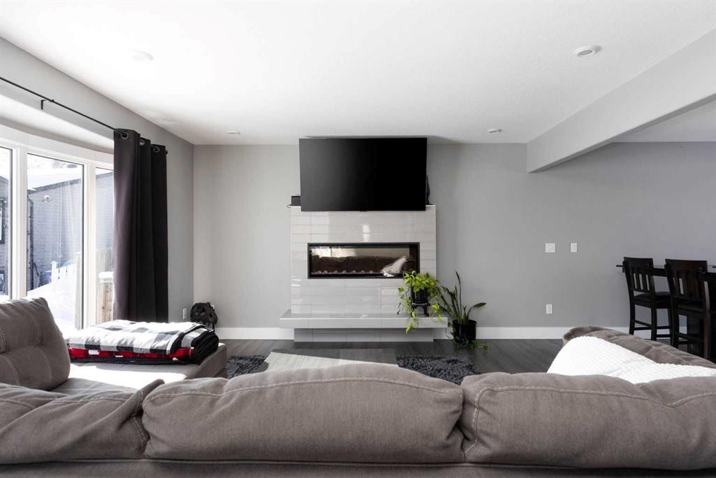 157 Beaumont Crescent, Fort Mcmurray, AB - Indoor Photo Showing Living Room With Fireplace