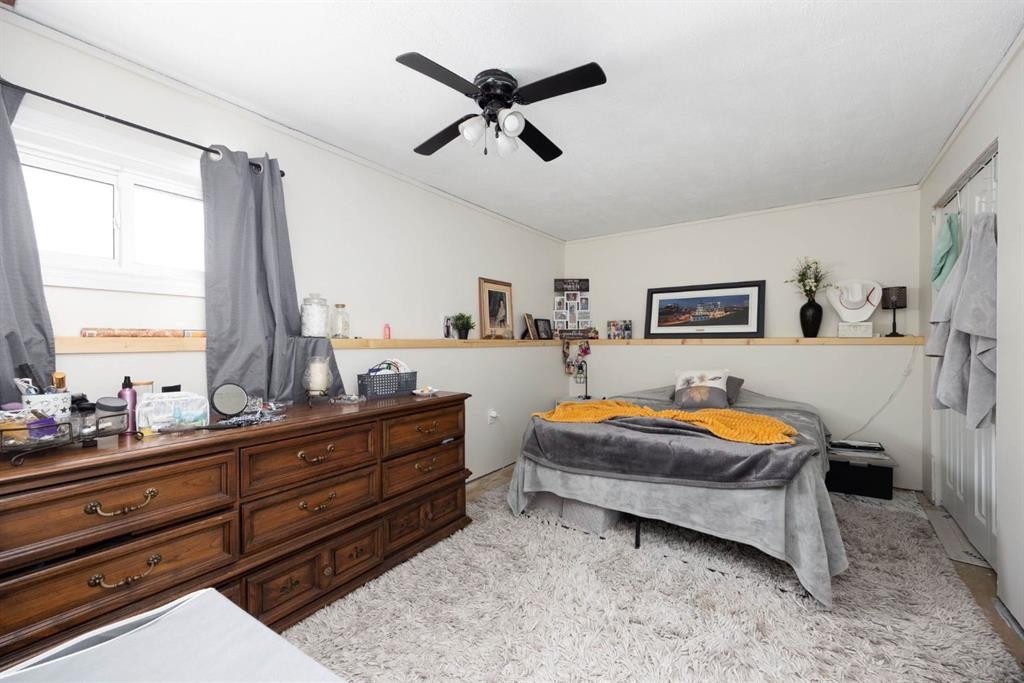 100 Christina Drive, Anzac, AB - Indoor Photo Showing Bedroom
