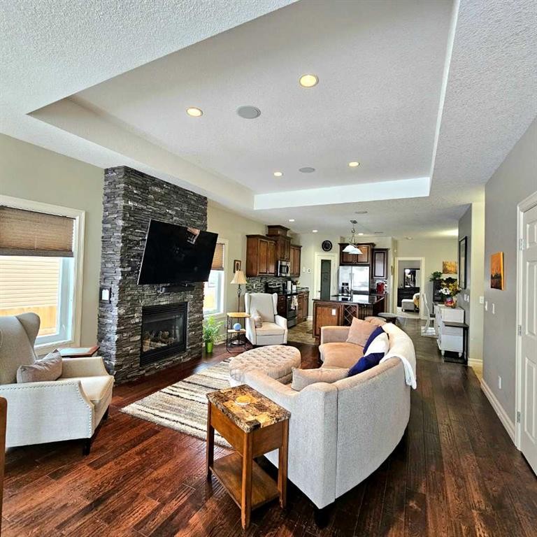 307 Highland Way, Lac La Biche, AB - Indoor Photo Showing Living Room With Fireplace