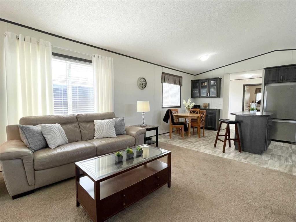 145 Caouette Crest, Fort Mcmurray, AB - Indoor Photo Showing Living Room