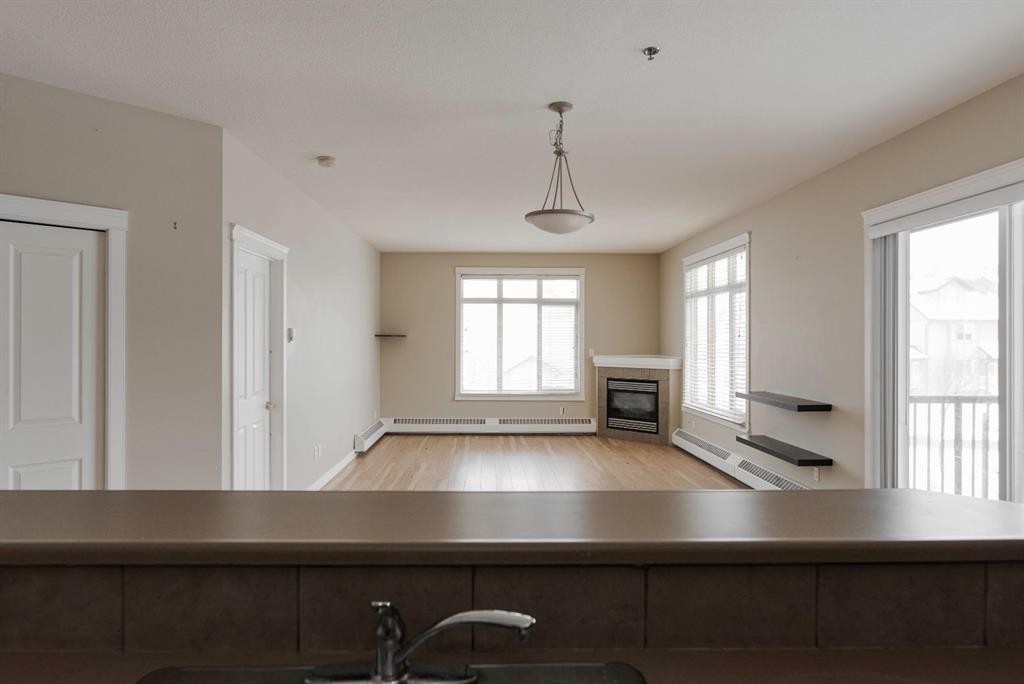 204-100 Denholm Gate, Fort Mcmurray, AB - Indoor With Fireplace