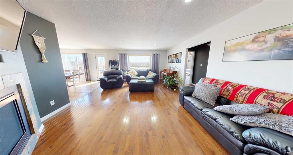 9221 91 Ave, Lac La Biche, AB - Indoor Photo Showing Living Room With Fireplace