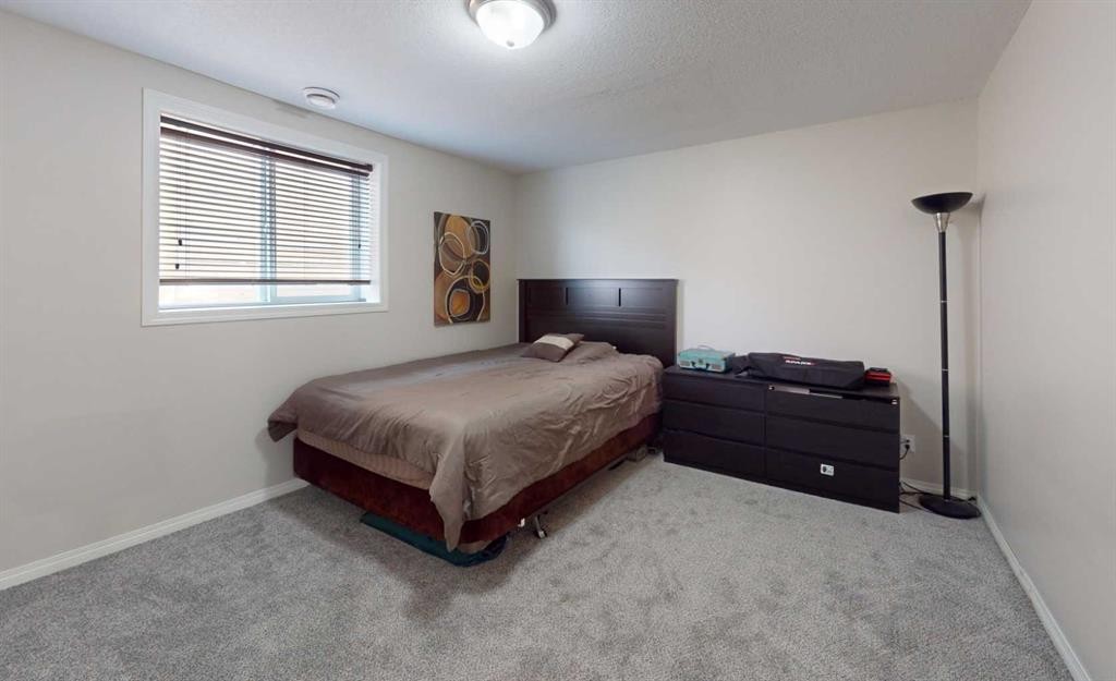 9221 91 Ave, Lac La Biche, AB - Indoor Photo Showing Bedroom
