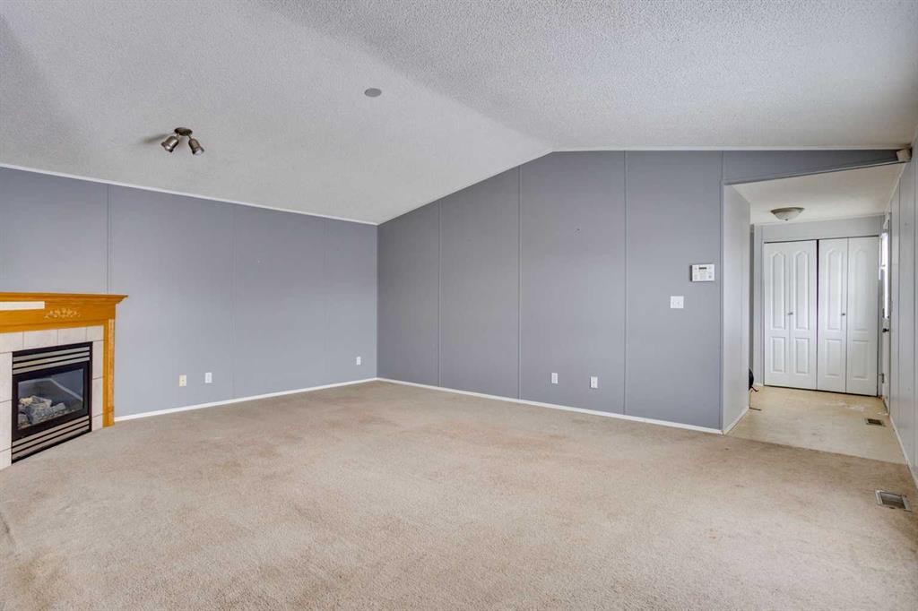 377 Ash Way, Fort Mcmurray, AB - Indoor Photo Showing Other Room With Fireplace
