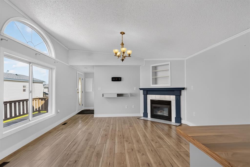 177 Couture Lane, Fort Mcmurray, AB - Indoor Photo Showing Living Room With Fireplace