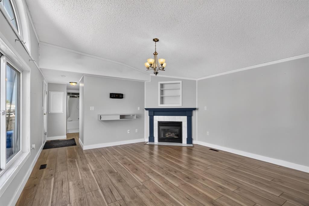 177 Couture Lane, Fort Mcmurray, AB - Indoor Photo Showing Living Room With Fireplace