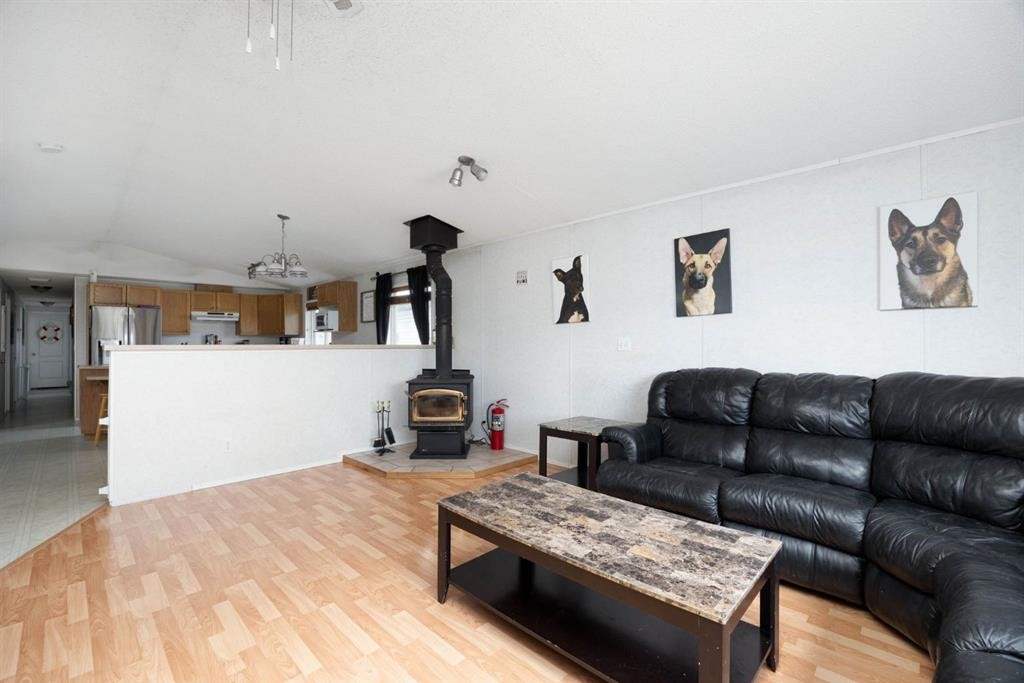 212 Gregoire Crescent, Fort Mcmurray, AB - Indoor Photo Showing Living Room With Fireplace