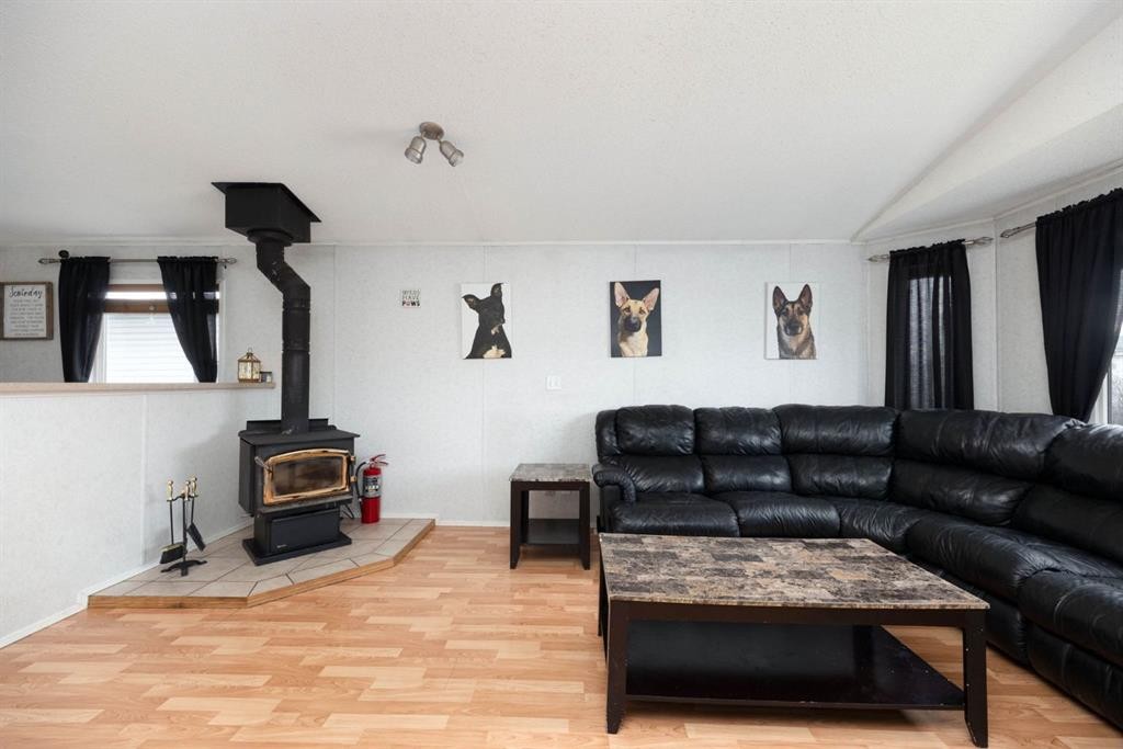 212 Gregoire Crescent, Fort Mcmurray, AB - Indoor Photo Showing Living Room With Fireplace
