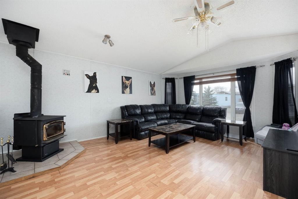 212 Gregoire Crescent, Fort Mcmurray, AB - Indoor Photo Showing Living Room With Fireplace