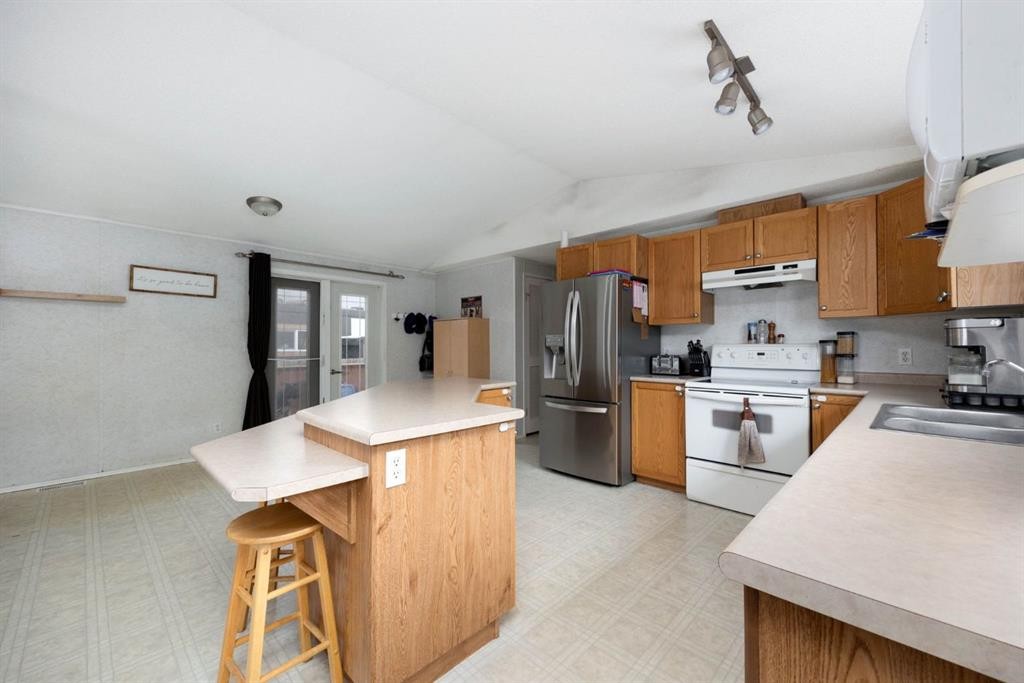 212 Gregoire Crescent, Fort Mcmurray, AB - Indoor Photo Showing Kitchen With Double Sink