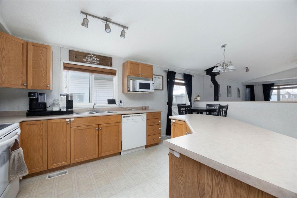 212 Gregoire Crescent, Fort Mcmurray, AB - Indoor Photo Showing Kitchen With Double Sink