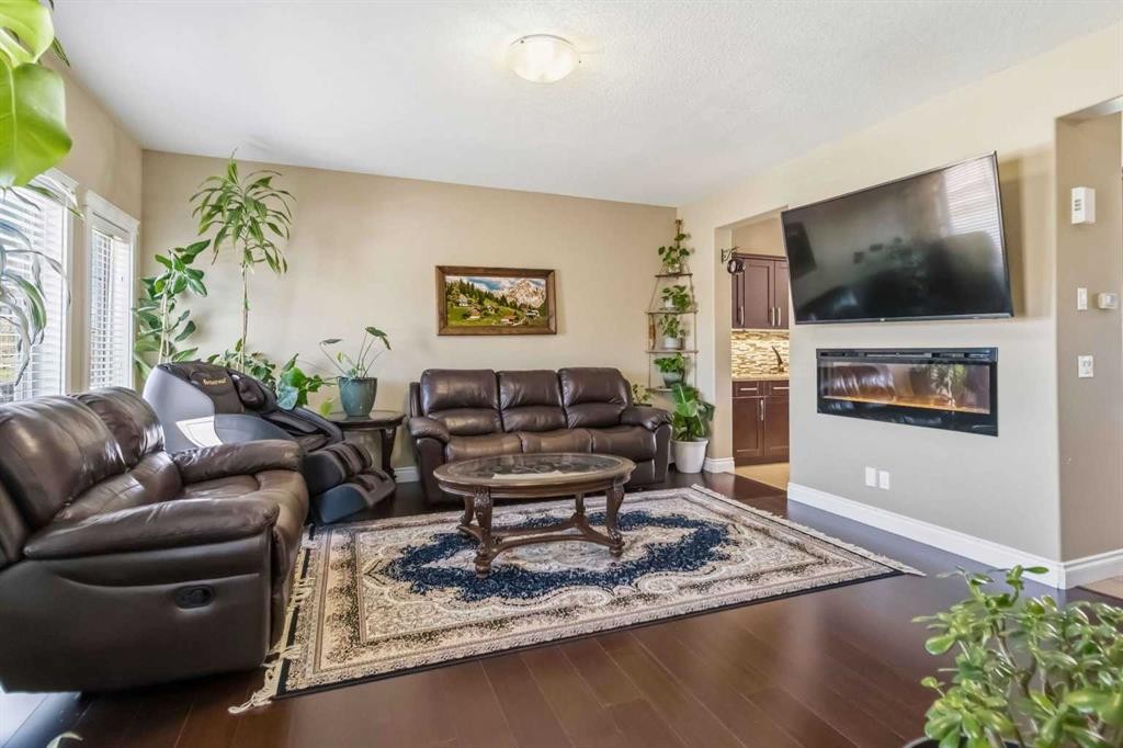 19-300 Sparrow Hawk Drive, Fort Mcmurray, AB - Indoor Photo Showing Living Room With Fireplace