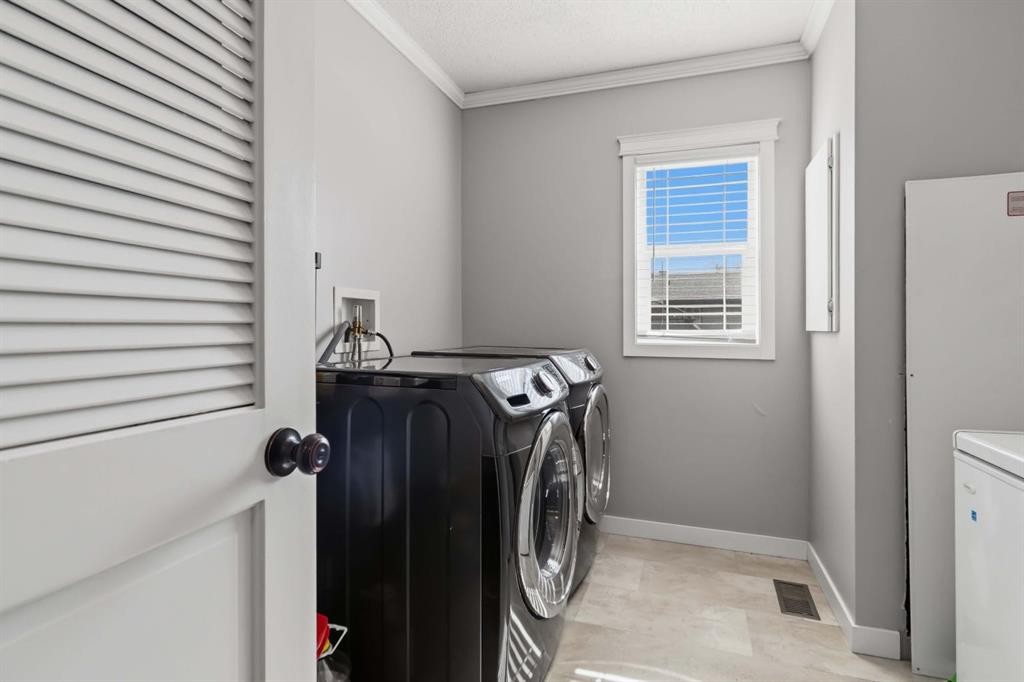 157 Gregoire Crescent, Fort Mcmurray, AB - Indoor Photo Showing Laundry Room