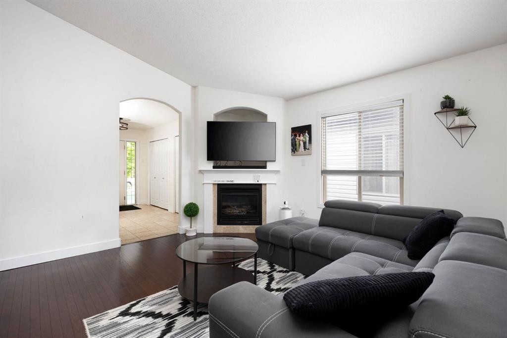 128 Hawthorn Way, Fort Mcmurray, AB - Indoor Photo Showing Living Room With Fireplace