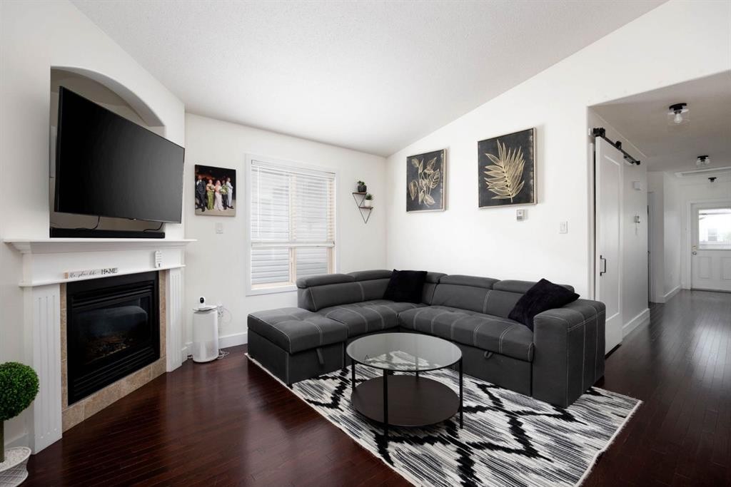 128 Hawthorn Way, Fort Mcmurray, AB - Indoor Photo Showing Living Room With Fireplace