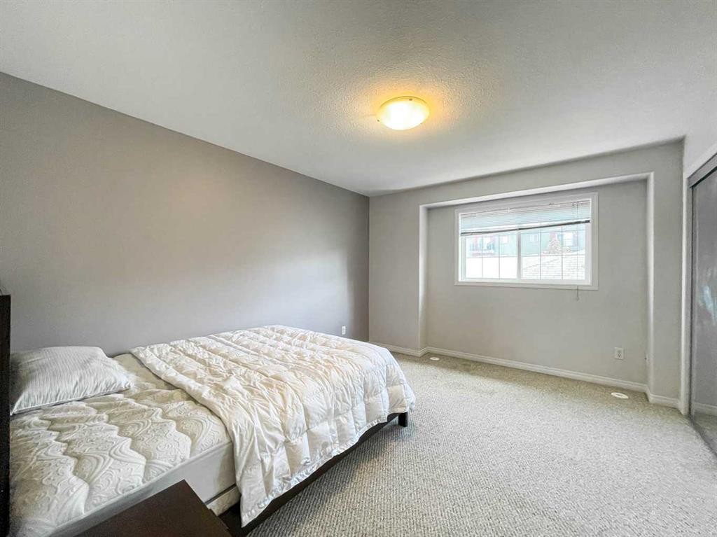 7108-200 Lougheed Drive, Fort Mcmurray, AB - Indoor Photo Showing Bedroom