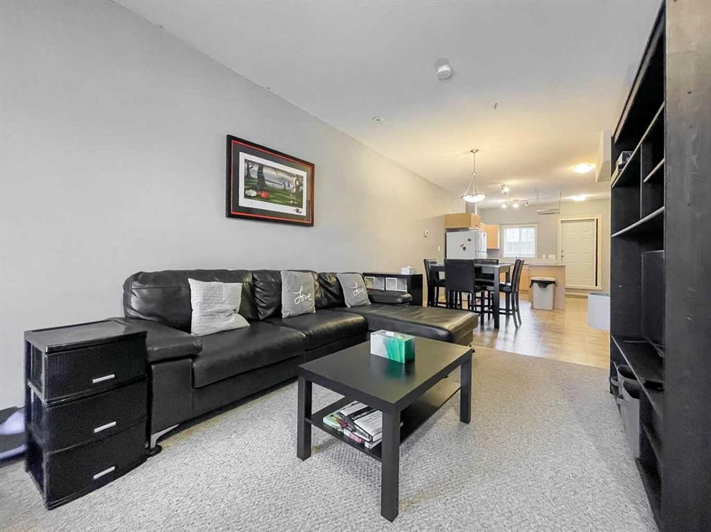 7108-200 Lougheed Drive, Fort Mcmurray, AB - Indoor Photo Showing Living Room