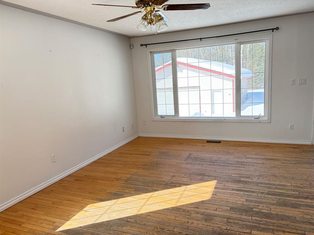 83 Aspen Crescent, Gregoire Lake Estates, AB - Indoor Photo Showing Other Room