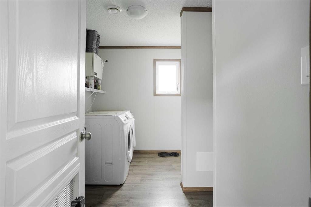 104 Beacon Hill Place, Fort Mcmurray, AB - Indoor Photo Showing Laundry Room