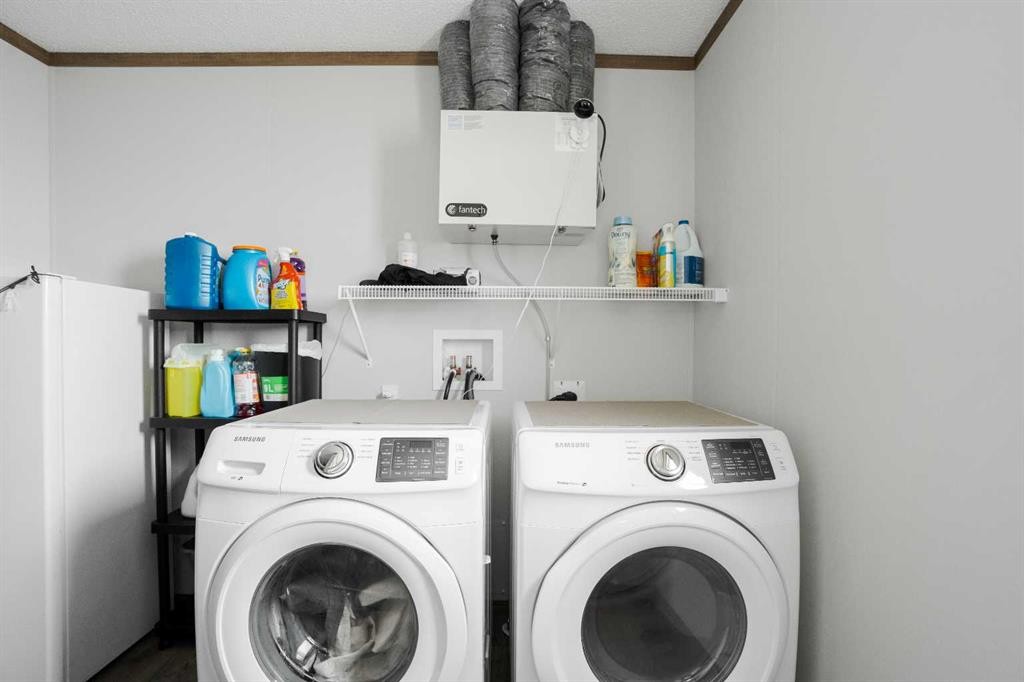 104 Beacon Hill Place, Fort Mcmurray, AB - Indoor Photo Showing Laundry Room