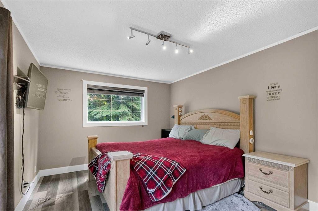 102 Gregoire Drive, Anzac, AB - Indoor Photo Showing Bedroom