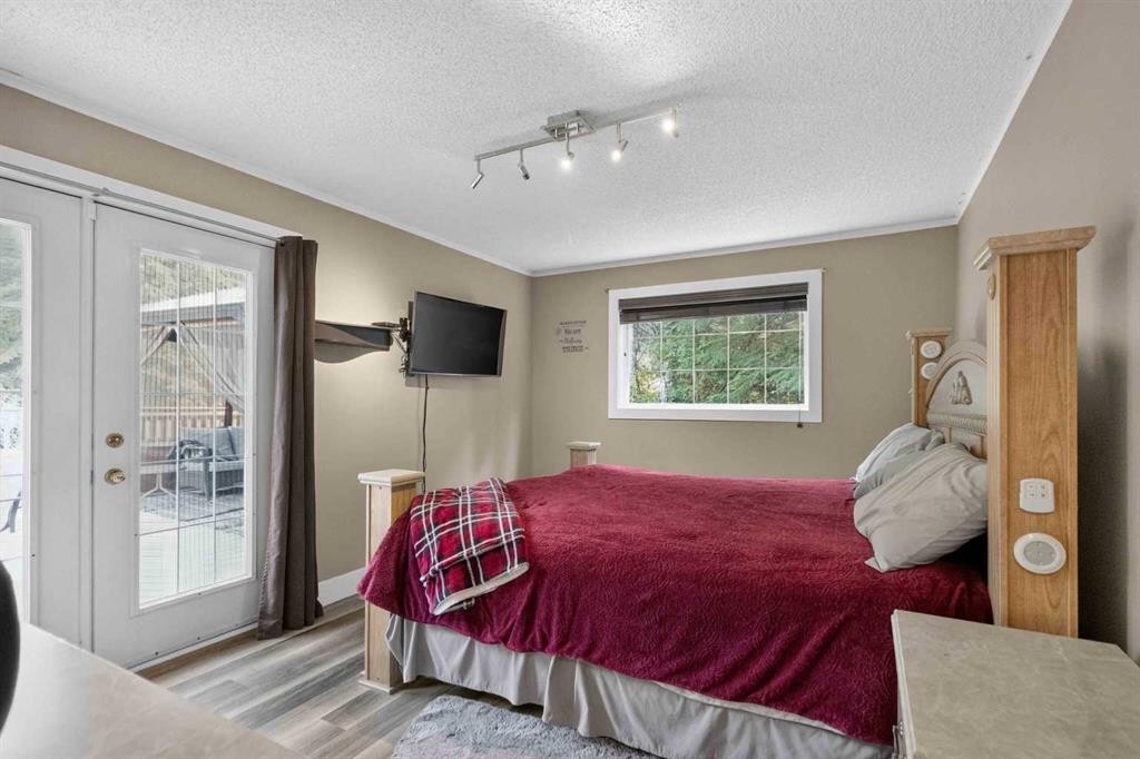 102 Gregoire Drive, Anzac, AB - Indoor Photo Showing Bedroom