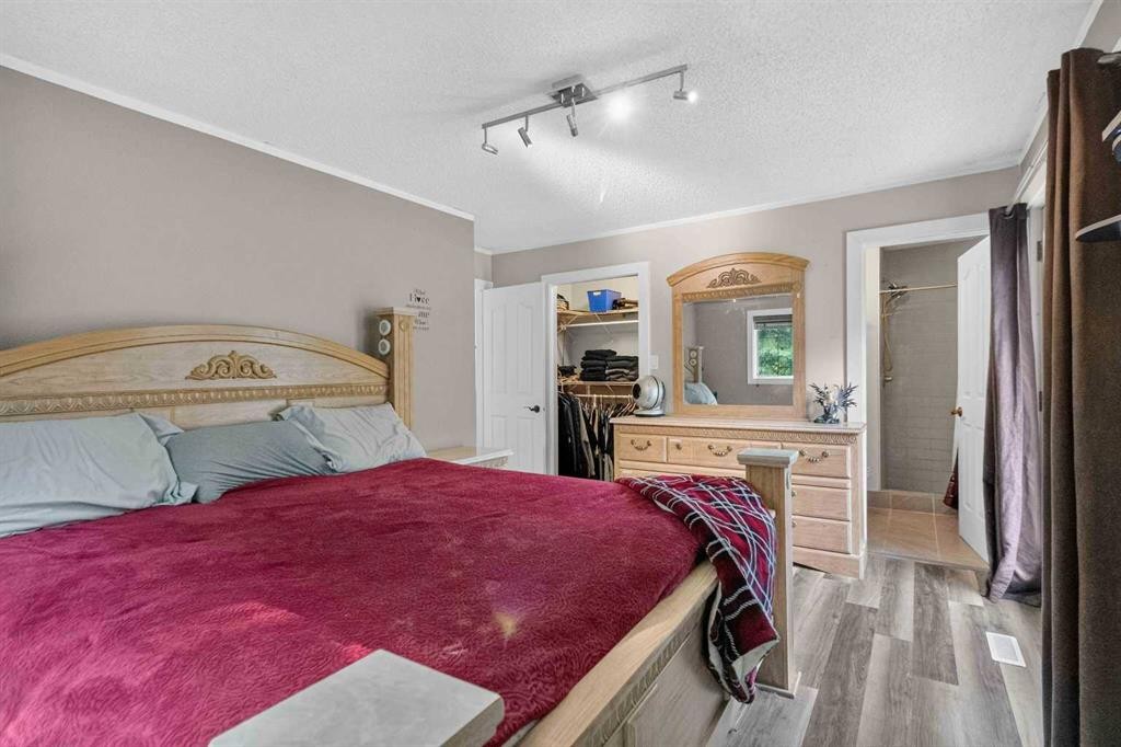 102 Gregoire Drive, Anzac, AB - Indoor Photo Showing Bedroom
