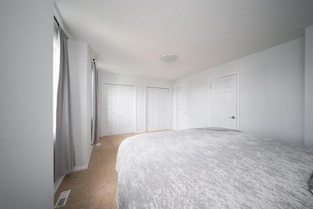 53-100 St.Laurent Way, Fort Mcmurray, AB - Indoor Photo Showing Bedroom