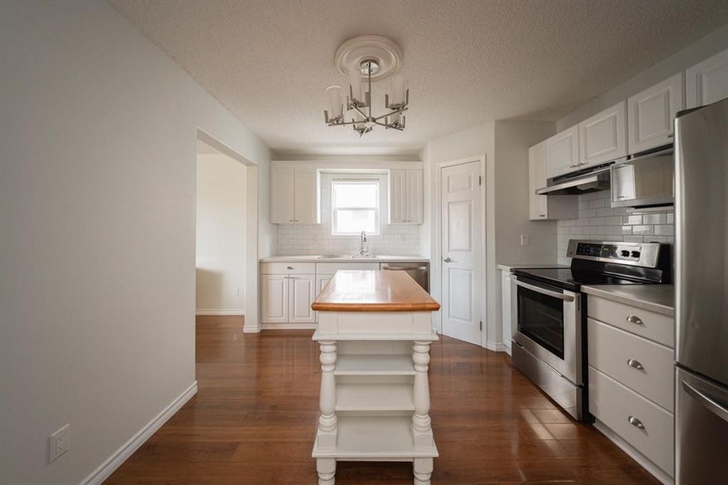 53-100 St.Laurent Way, Fort Mcmurray, AB - Indoor Photo Showing Kitchen With Stainless Steel Kitchen