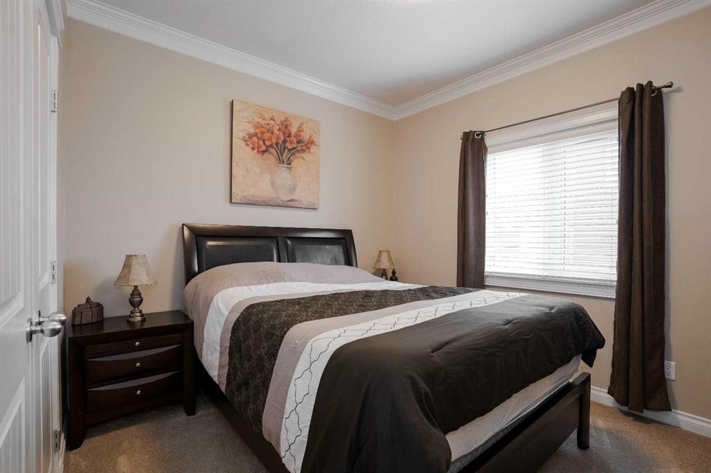 128 Dogwood Lane, Fort Mcmurray, AB - Indoor Photo Showing Bedroom