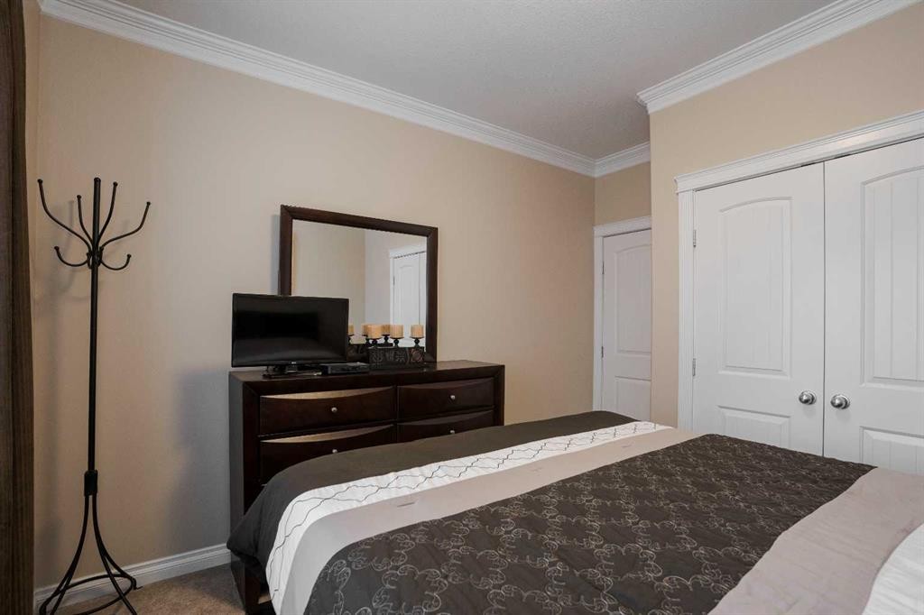 128 Dogwood Lane, Fort Mcmurray, AB - Indoor Photo Showing Bedroom